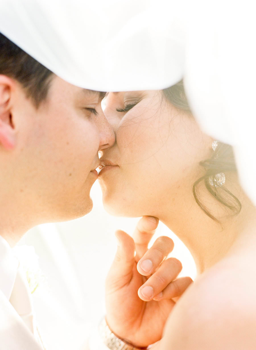 First Kiss During Wedding Ceremony of Bride and Groom | KT Crabb Photography