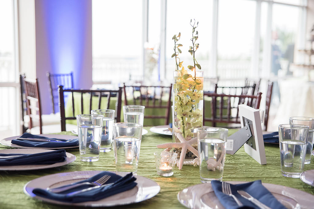 Beach, Nautical Wedding Reception Decor With Blue and Green Table Linens, Starfish Accent and Flowers Submerged in Water Centerpiece
