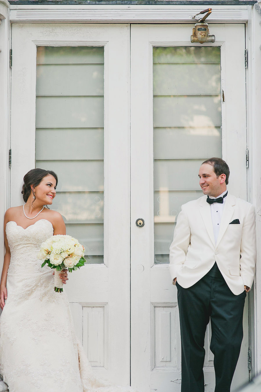Bride and Groom Wedding Portrait in Ybor City | Bridal Hair & Makeup by Lasting Luxe | Tampa Wedding Photographer Roohi Photography