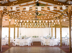 Elegant Rustic Outdoor Tampa Wedding Reception with Cafe Lighting and Burlap Decor with White Linen Round Tables|Cross Creek Ranch Tampa Wedding Venue