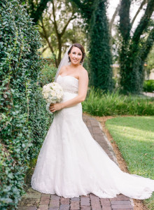 Bridal Wedding Day Portrait in Strapless Wedding Gown with Veil and White Rose Bouquet