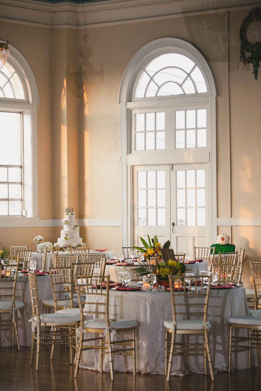 Indoor Ybor City Wedding Reception Decor with White Linens and Gold Chiavari Chairs | Tampa Wedding Venue The Cuban Club