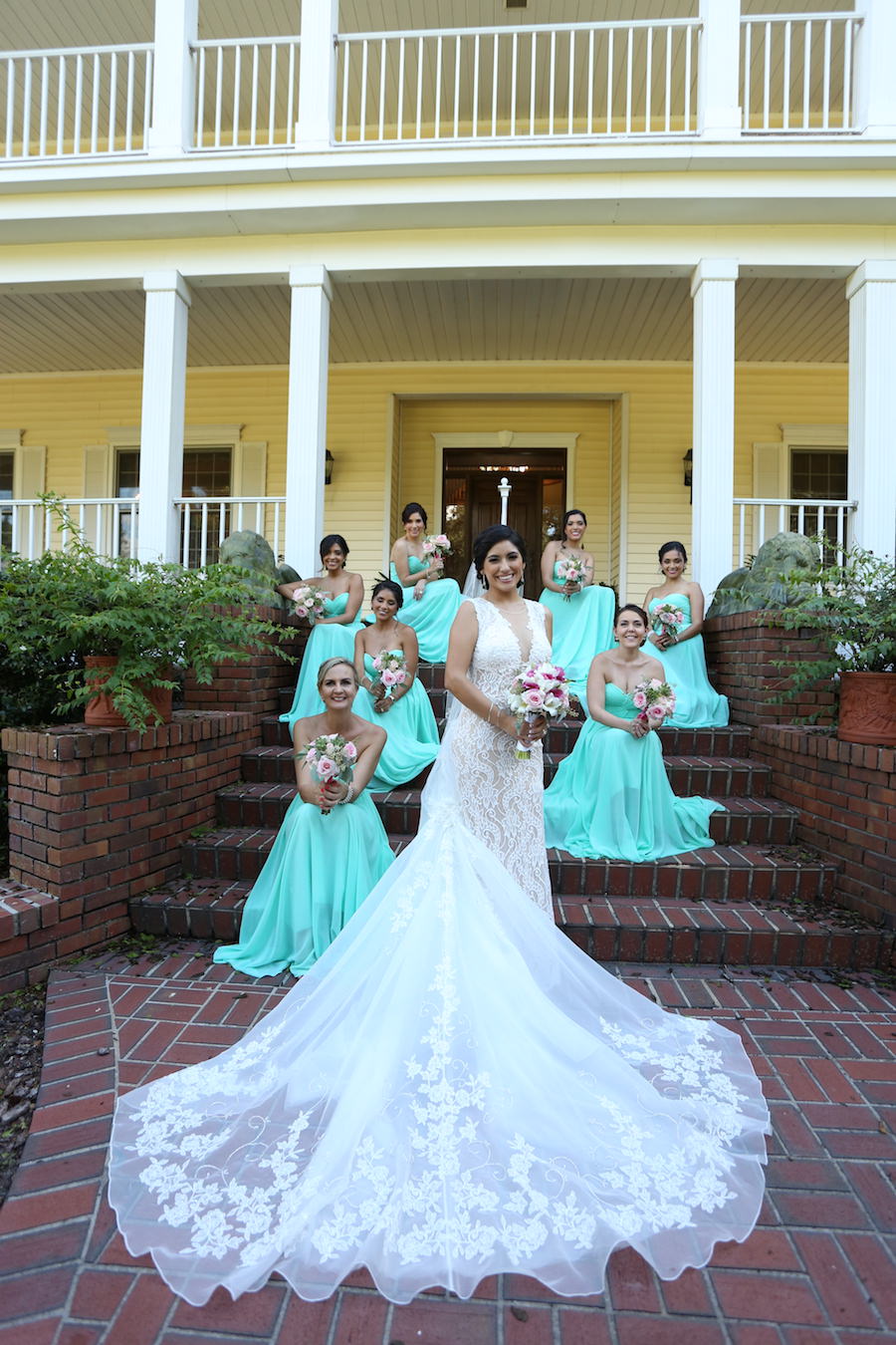Florida Bride and Bridesmaids, Outdoor Wedding Portraits in Lace Wedding Dress with Long Train and Mint Green Bridesmaids Dresses