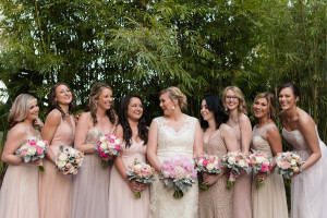 Bride and Bridesmaids Bridal Party Portrait with Ivory, Lace Wedding Dress, Neutral Bella Bridesmaids Dresses and Pink and White Floral Bouquets | St. Petersburg Wedding Photographer Caroline & Evan Photography | Hair and Makeup by Michele Renee The Studio