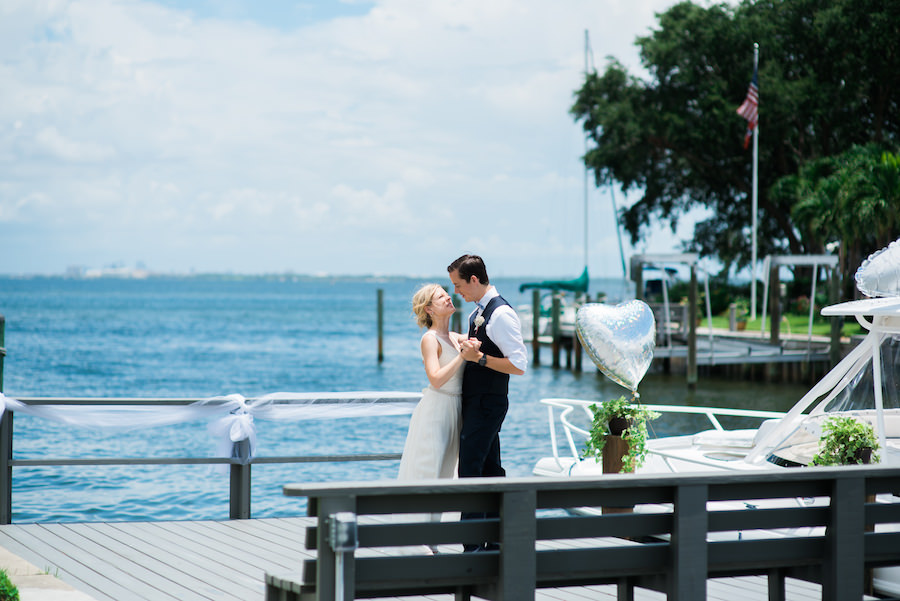 St, Petersburg Bride and Groom First Dance Outdoor Wedding Portrait on Dock at Private Home Residence | St. Pete Wedding Photographer Kera Photography