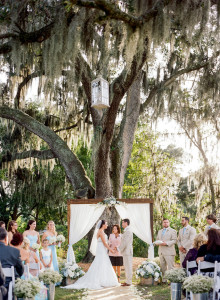 Rustic Outdoor Tampa Wedding Ceremony | Cross Creek Ranch Tampa Wedding Venue | Rustic Outdoor Tampa Weddings with White Draped Altar and White Folding Chairs