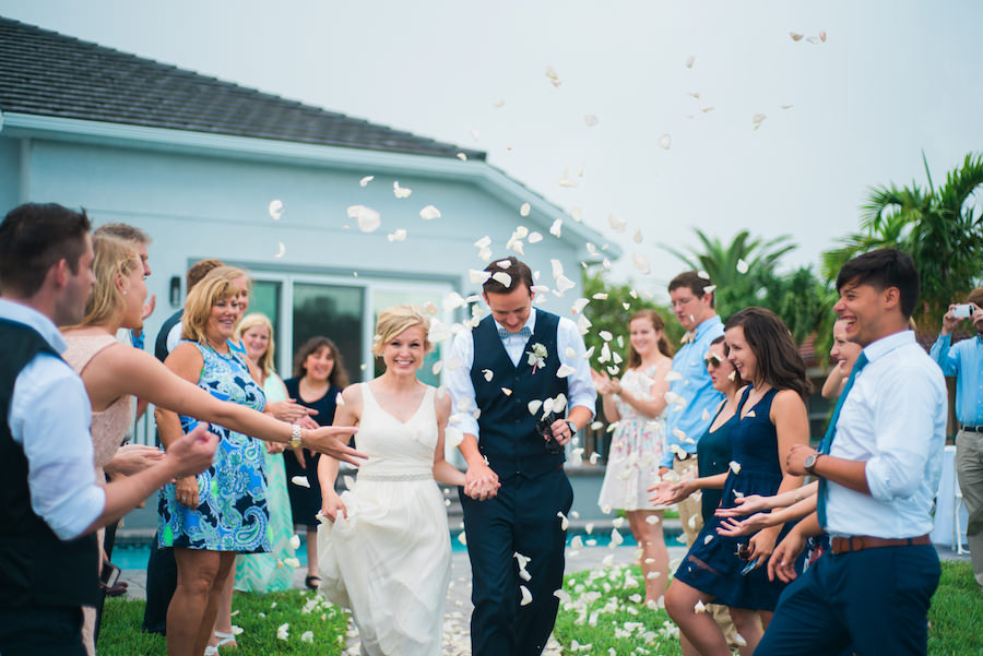 Bride and Groom Wedding Reception Exit with Floral Petals | St. Petersburg Wedding Photographer Kera Photography