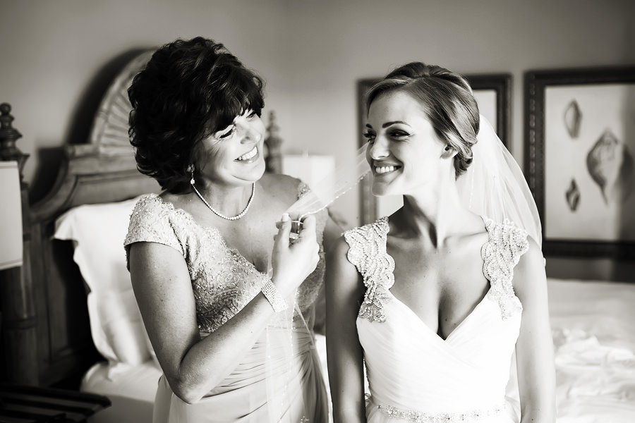 Getting Ready: Clearwater Beach Bridal Wedding Portrait of Bride and Mom Putting on Veil | Clearwater Beach Wedding Photographer Limelight Photography