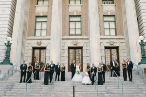 Outdoor, Tampa Bride and Groom and Bridal Party Wedding Portrait in Black Bridesmaid Dreses and Tuxedos | Downtown Tampa Wedding Venue Le Meriden Hotel