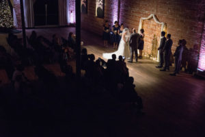 Indoor Wedding Ceremony with Exposed Brick Wall Backdrop at Modern, Downtown St. Pete Wedding Venue NOVA 535