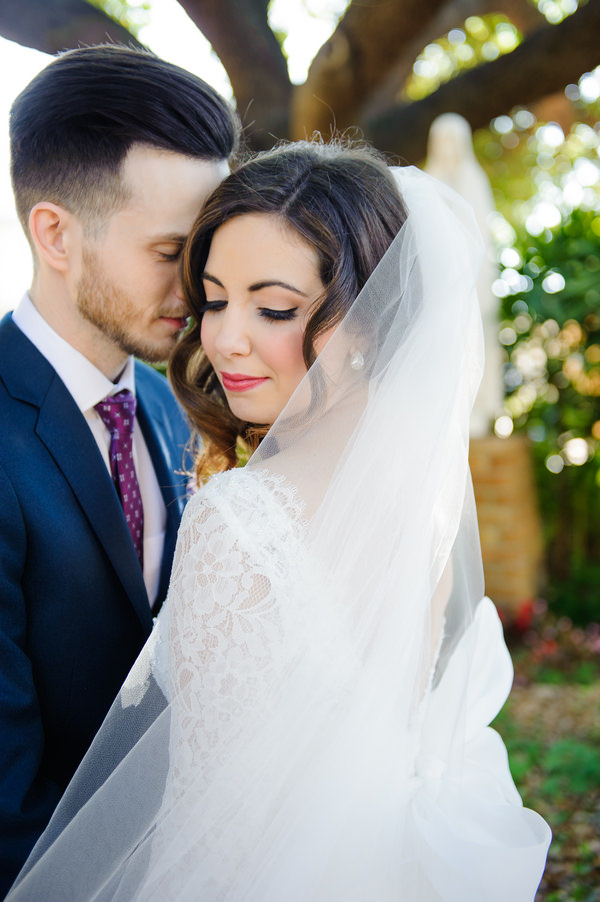 Bride and Groom Wedding Portrait | Mikaella Bridal Lace Wedding Dress with Sleeves