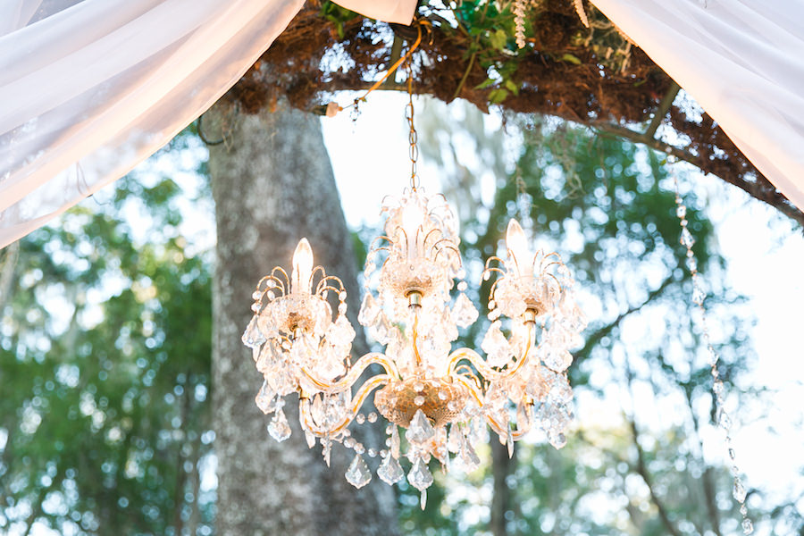 Shabby Chic Outdoor Wedding Ceremony Décor with Chandelier Archway