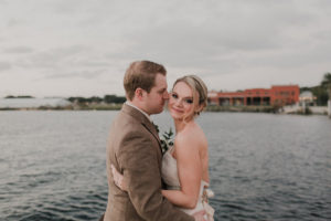 Outdoor, Downtown Tampa Waterfront Bride and Groom Wedding Portrait in Strapless JLM Couture Wedding Dress | Tampa Wedding Makeup Artist Lindsay Does Makeup