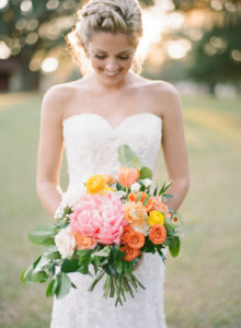Tampa Bay Florida Bride in Sweetheart Wedding Dress with Orange, Yellow and Pink Wedding Bouquet