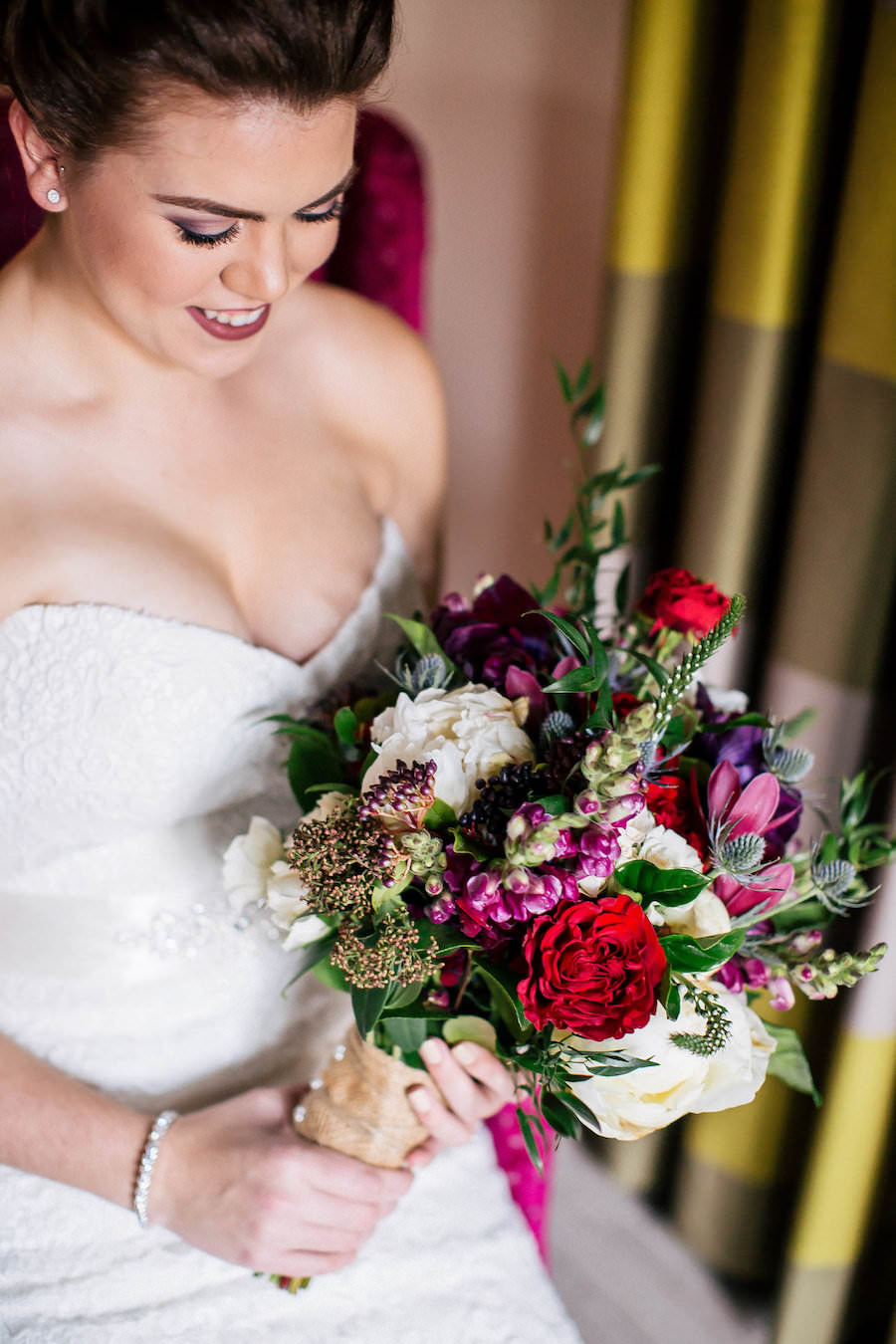 Bride with Red and Pink Wedding Bouquet with Greenery