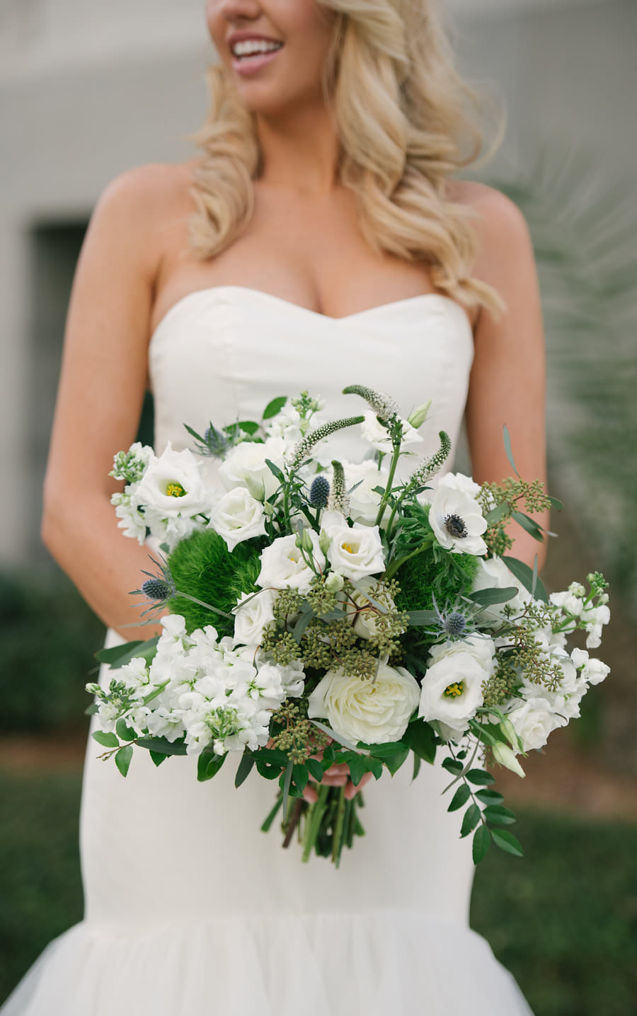 Tampa Bridal Wedding Portrait in Ivory, Strapless Hayley Paige Wedding Dress and Green and White Floral Bouquet