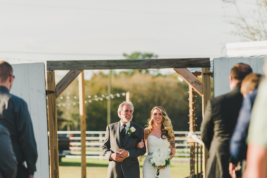 Bride and Dad Walking Down the Aisle in Outdoor Wedding Ceremony | Plant City Wedding Venue Wishing Well Barn