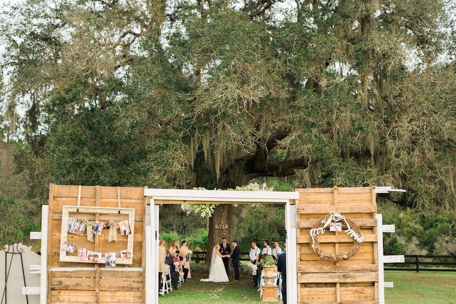 Outdoor Shabby Chic, Southern Wedding Ceremony Under Spanish Moss Tree | Tampa Wedding Photographer Kera Photography | Dade City Wedding Venue Barrington Hill Farm