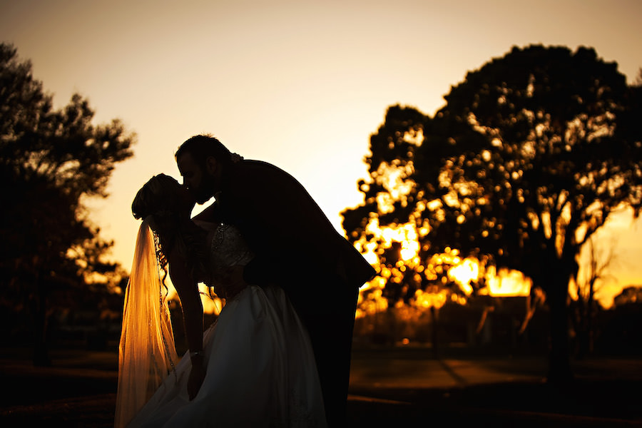 Bride and Groom Sunset Wedding Portrait by Limelight Photography at Clearwater Country Club Wedding Venue