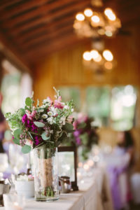 Indoor, Barn Reception Decor with Purple and Green Bridal Bouquet
