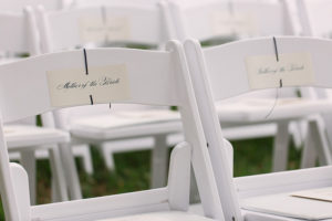 Wedding Ceremony White Chairs with Mother of the Bride Reserved Seating Cards
