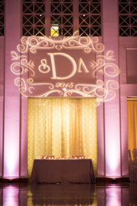 Wedding Reception Pink Uplighting and Projection GOBO of Bride and Groom's Initials | Tampa Wedding Lighting Nature Coast Entertainment Services
