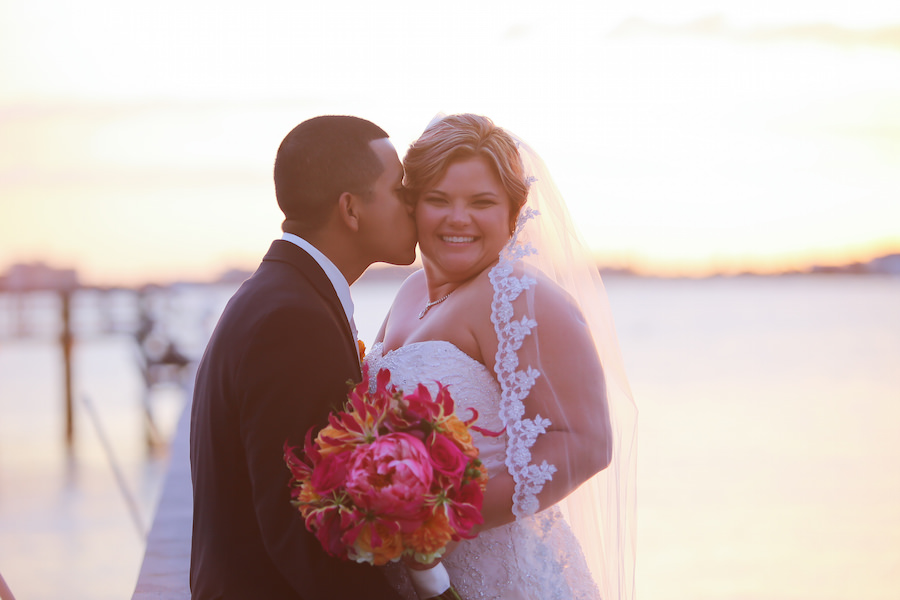 Bride and Groom St Petersburg Sunset Wedding Portrait with Fuchsia and Orange Bouquet | Hair and Makeup by Michele Renee The Studio