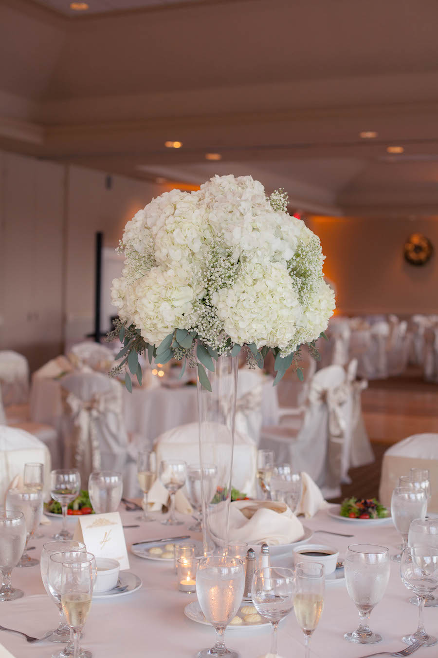 Tall White Hydrangea and Baby’s Breath Wedding Centerpiece Flowers in Clear Vase | White and Ivory Wedding | Tampa Wedding Floral Designer Northside Florist