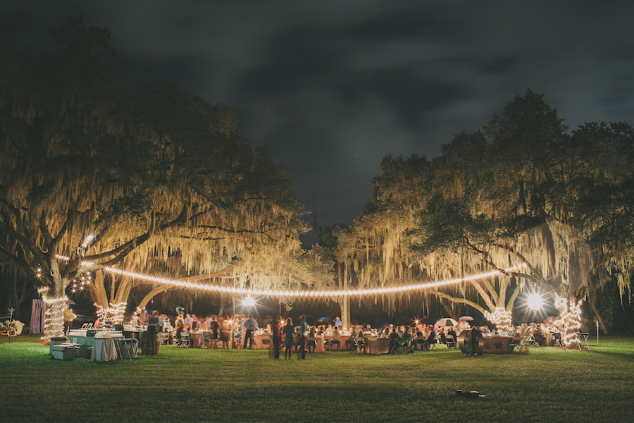 Outdoor, Rustic Nighttime Sarasota Wedding Reception with Tree Strung Market Lights | Sarasota Wedding Venue Southern Oaks Reception with Tree Strung Lights