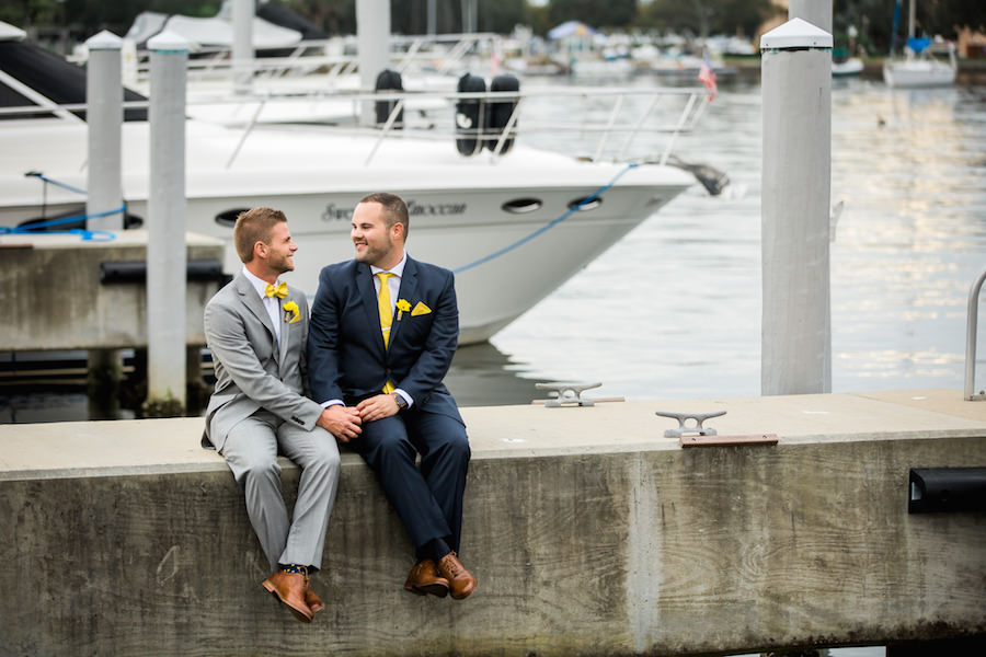 St. Petersburg Waterfront Marina Same Sex Wedding Portrait in Navy Blue and Gray Suits | Nautical Inspired Florida Wedding
