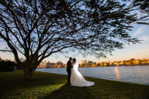 Outdoor, Waterfront Bride and Groom Sunset Wedding Portrait | Tampa Wedding Venue Davis Island Garden Club