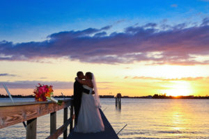 Bride and Groom Florida Sunset Waterfront Wedding Portrait | St Petersburg Wedding Planner Exquisite Events