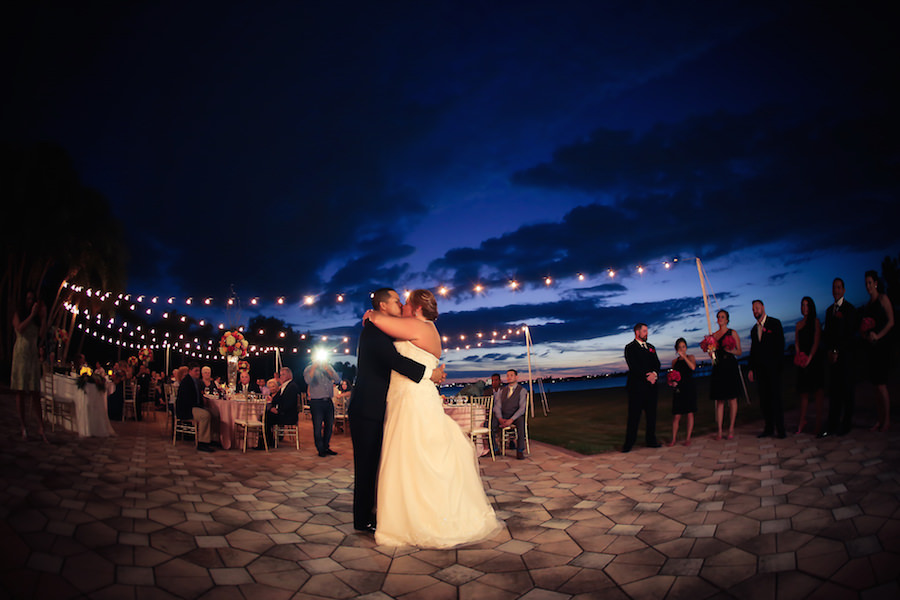Bride and Groom Outdoor St Petersburg Wedding Reception First Dance with Market Lighting | Exquisite Events Wedding Planner
