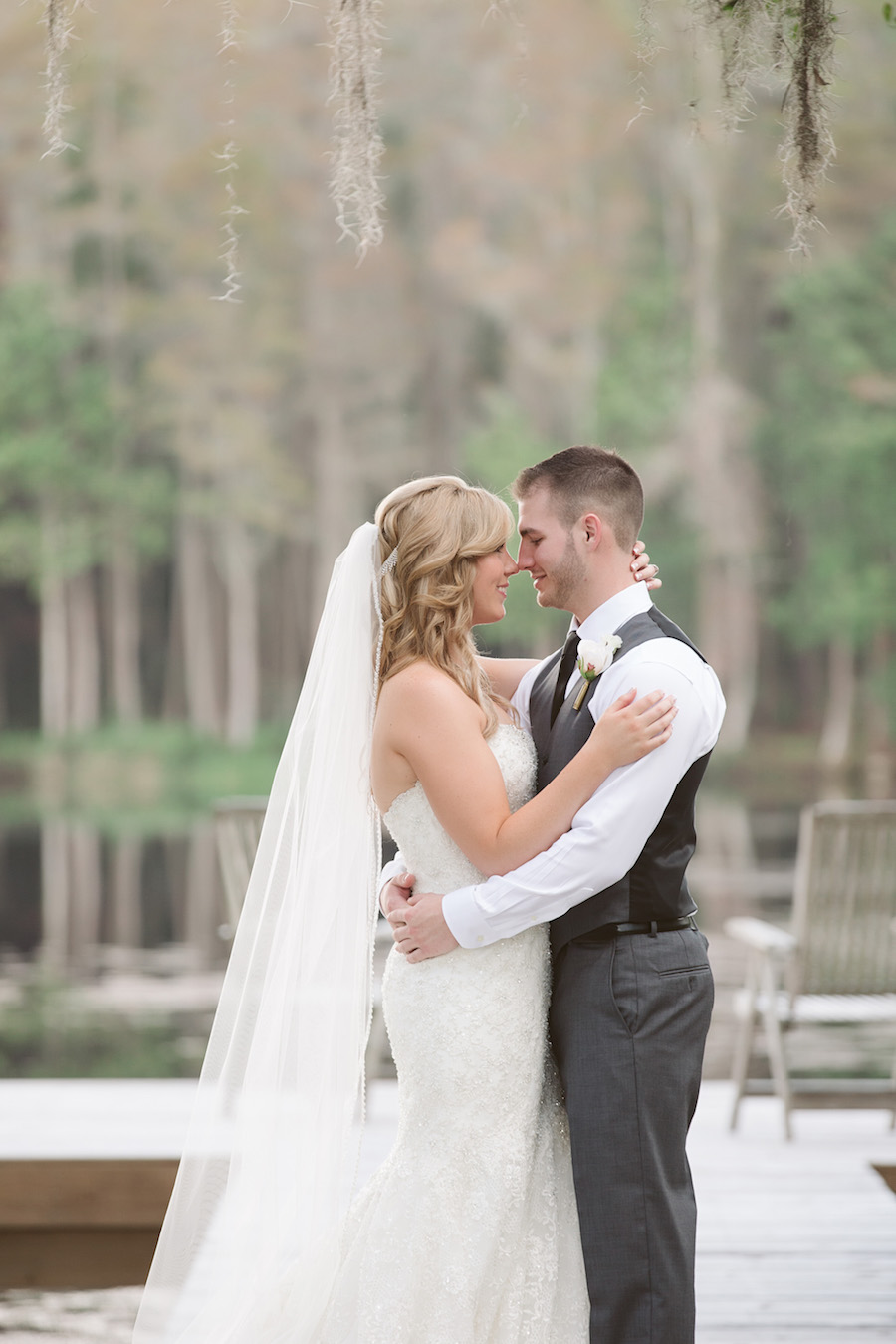 Outdoor Rustic Lakeside Bride and Groom Wedding Portrait | Allure Couture Ivory Lace Trumpet Wedding Gown with Cathedral Veil