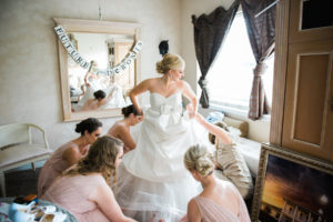 Putting On David's Bridal - Galina Dress Getting Ready Wedding Portrait | Tampa Bay Wedding Photographer Kera Photography