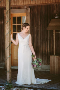 Outdoor, Odessa Bridal Wedding Portrait in Ivory Wedding Dress and Purple and Pink Floral Bouquet