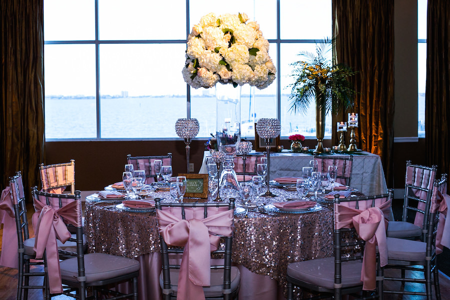 Tall White Wedding Centerpiece by Iza's Flowers and Sequined Linens by Over the Top Event Rentals | Pinspotting Lights by Nature Coast Entertainment Services | St. Petersburg Wedding Venue Isla del Sol Yacht and Country Club