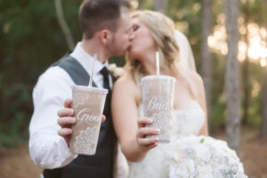 Bride and Groom Wedding Portrait with Personalized Tumblers | Allure Couture Wedding Dress with White Brooch Bouquet | Tampa Bay Northside Florist