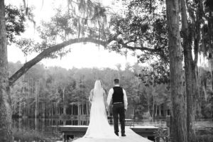 Outdoor Lakeside, Waterfront Bride and Groom Tampa Bay Wedding Portrait under Spanish Moss