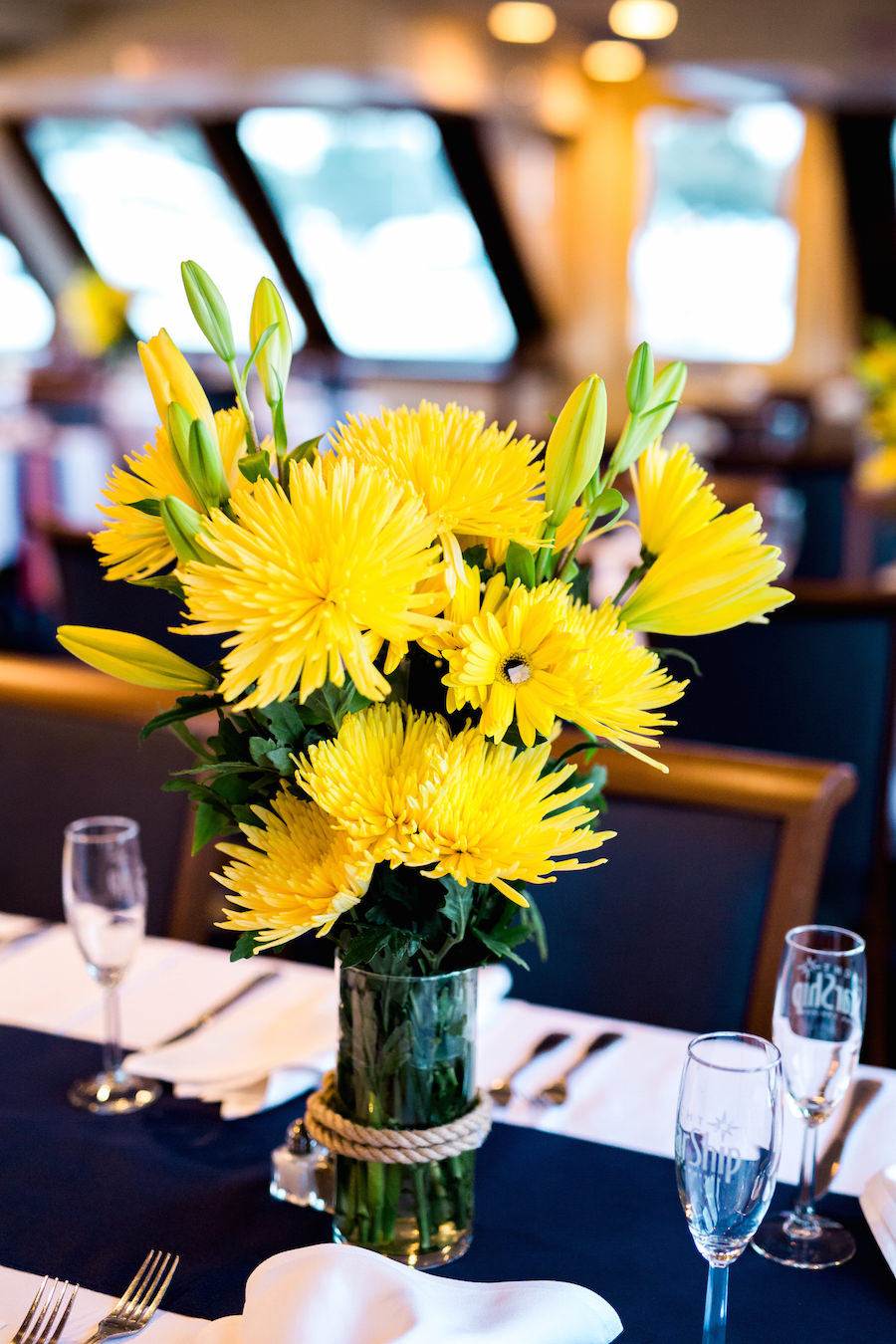 Yellow Spider Mum Nautical Wedding Centerpiece Flowers in Vase with Rope Detail on Navy Linens | Yacht Starship St. Petersburg Wedding Venue