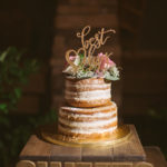 Round Naked Two-Tiered Wedding Cake with Light Pink Roses and Greenery | Tampa Wedding Cake Baker Corey’s Bakery