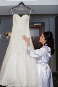 Getting Ready Bride in Silk Bridal Robe with Ivory, Strapless, Lace Wedding Dress