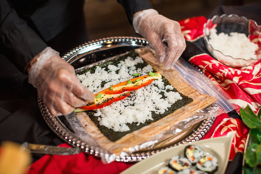 St. Petersburg Wedding Caterer Delectables Catering Sushi Rolling