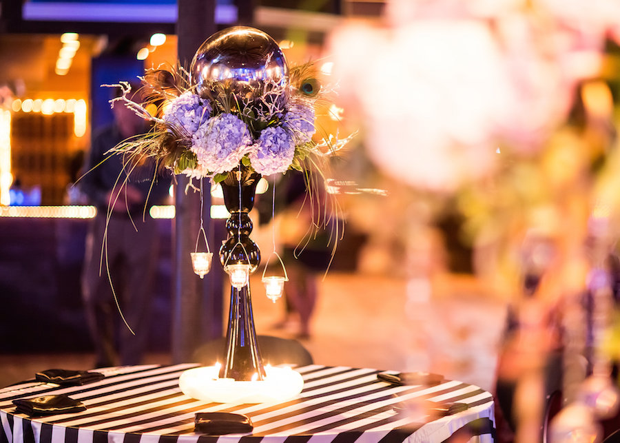 Puprle and Black Wedding Centerpiece with Silver Ball Orb and Black & White Striped Linens | St. Petersburg Wedding Florist Apple Blossoms Floral Design and Over the Top Linen Rentals