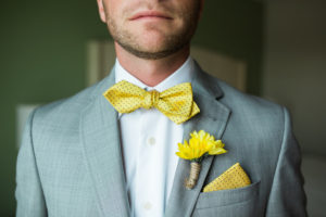 Grey Linen Suit with Yellow Bowtie and Boutonniere with Rope Detail | Nautical Inspired Groom's Attire