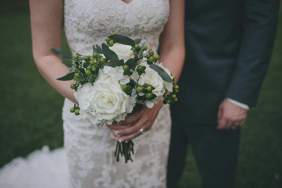 Outdoor, Bride and Groom Wedding Portrait in Lace, Ivory Wedding Gown and White Floral Rose Bouquet with Greenery