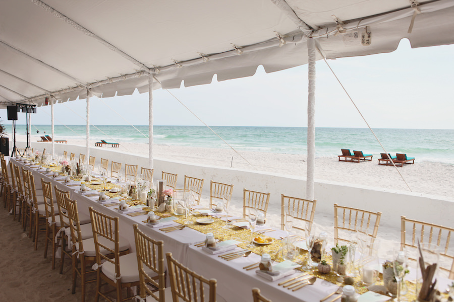 Tented, Florida Beach Wedding Reception with Gold Chiavari Chairs and Gold Table Runner | Anna Maria Island Wedding Planner Exquisite Events