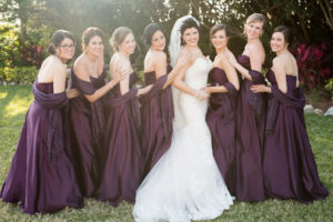 Tampa Bridal Party Portrait in Purple Bridesmaids Dresses and Ivory, Strapless Wedding Dress | Tampa Wedding Photographers Caroline and Evan Photography