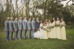 Yellow and Gray Wedding | Bridal Party Wedding Portrait with Yellow Bill Levkoff Bridesmaids Dresses and Ivory, Strapless Allure Lace Wedding Dress with White and Yellow Wedding Bouquet with Greenery | Sarasota Wedding Florist Andrea Layne Floral Design