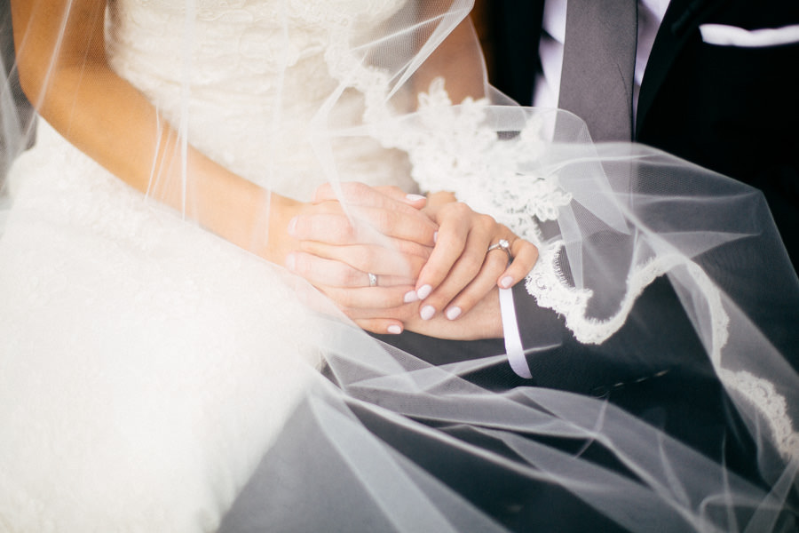 Sarasota Wedding Portrait of Bride and Groom Holding Hands